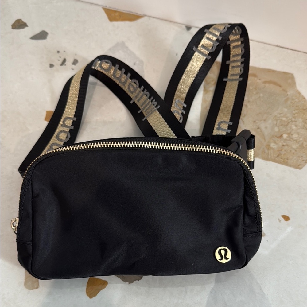 lululemon athletica Black Bag with Gold Accents